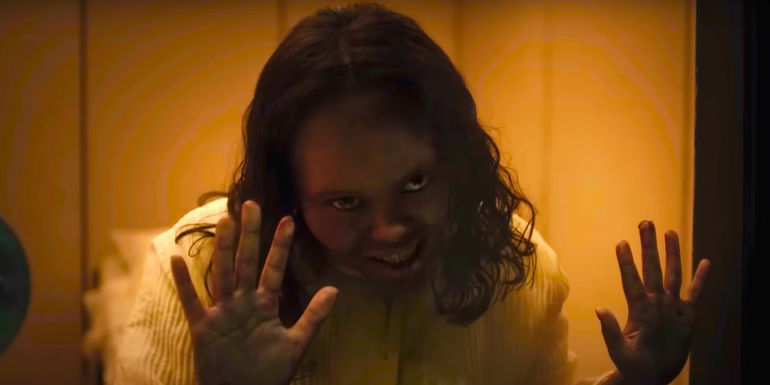 Angela possessed by Lamashtu smiling in The Exorcist Believer