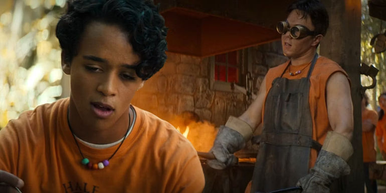 Chris Rodriguez next to a smither from the Hephaestus Cabin in Percy Jackson and the Olympians