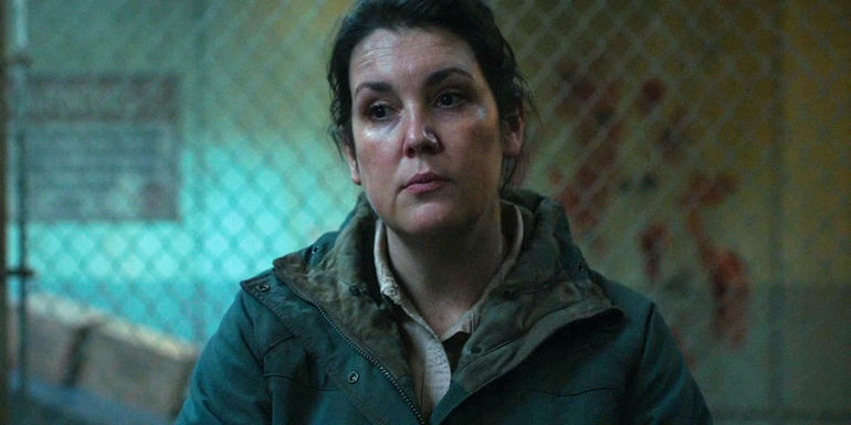 Kathleen (Melanie Lynskey) looking at the collaborators in The Last Of Us