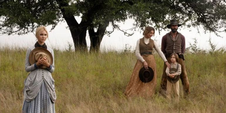 Margaret, James, Elsa and John Dutton stand in a field in 1883