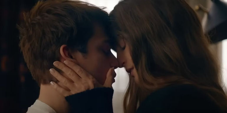 Anne Hathaway and Nicholas Galitzine in The Idea of You almost kissing