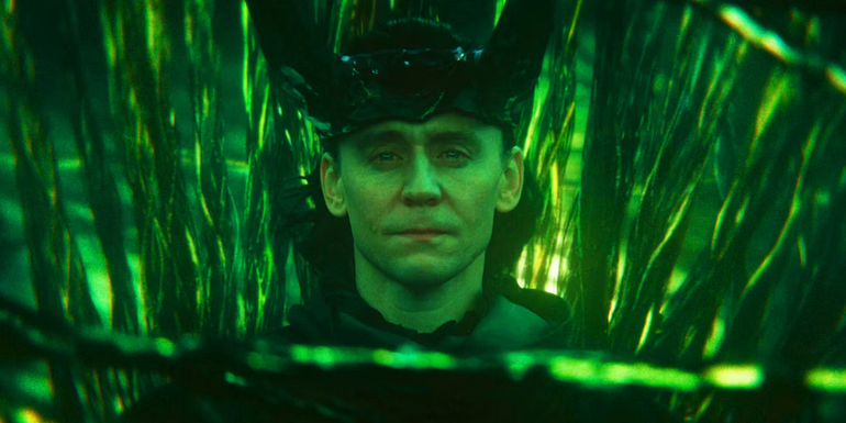 Loki looking solemnly at the camera as the protector of the multiverse