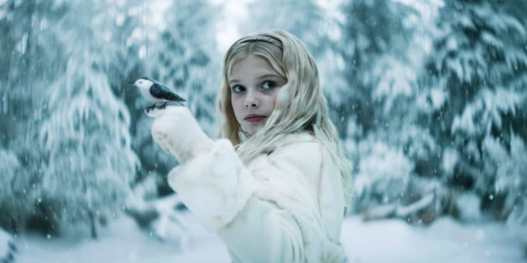 Princess Issa holding a bird perched on her finger in Rebel Moon-1