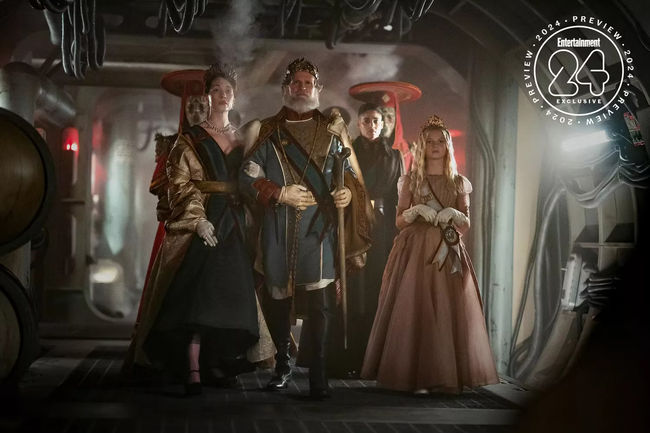 Sofia Boutella as Kora with the Royal Family in a Flashback in Rebel Moon Part Two The Scargiver