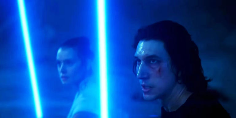 Rey and Ben Solo wielding their blue lightsabers in Star Wars: The Rise of Skywalker