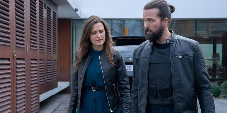 Amanda and Jimmy walking and talking in Kin season 2.