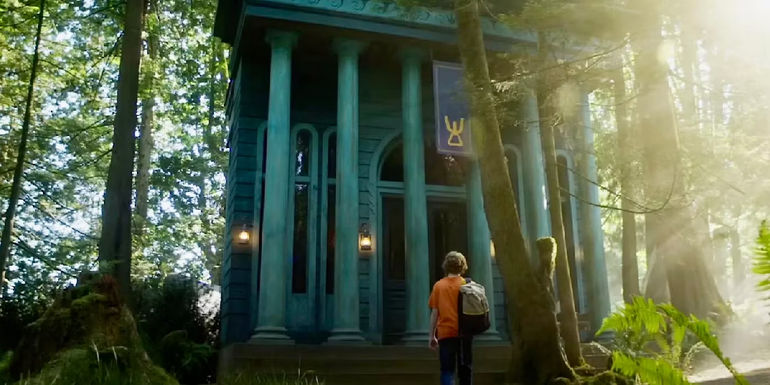 Percy standing in front of Poseidon's house at Camp Half-blood in Percy Jackson and the Olympians.