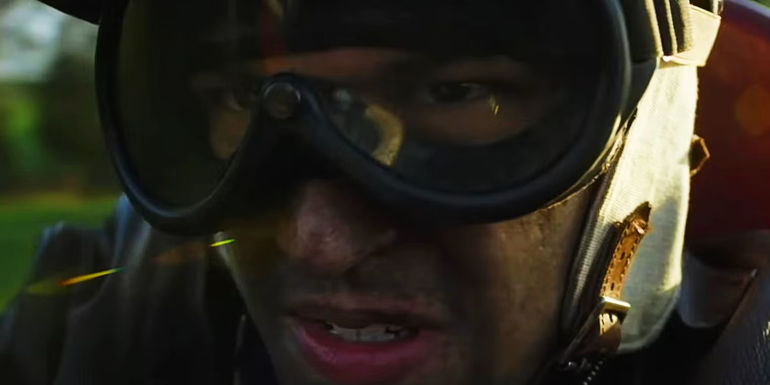 A close up of Gabriel Leone as Alfonso de Portago during a race in Ferrari