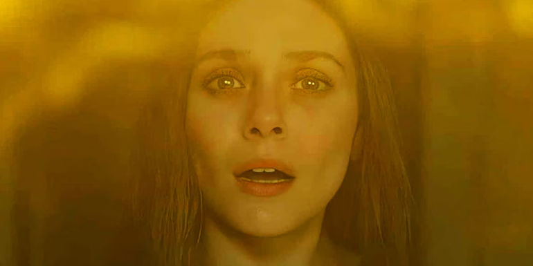 Wanda Maximoff looking at the Mind Stone in WandaVision