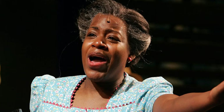 Fantasia The Color Purple singing onstage in blue dress