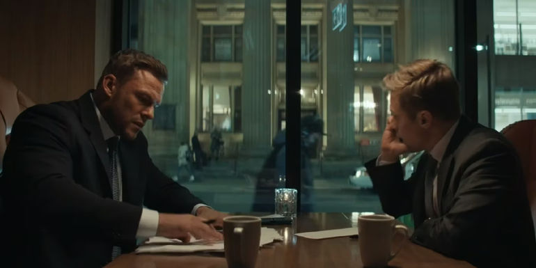 Reacher and O'Donnell sitting at a diner table in Reacher season 2