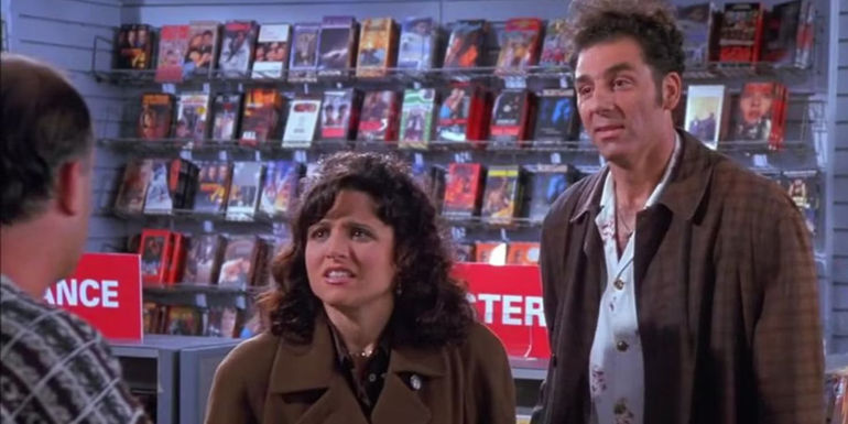 Kramer (Michael Richards) and Elaine (Julia Louis-Dreyfus) at a video store in Seinfeld