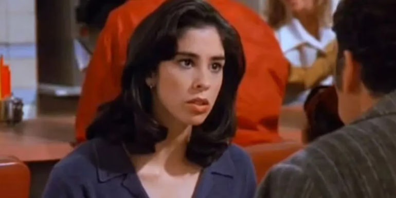Emily (Sarah Silverman) glaring at Kramer (Michael Richards) in a diner in Seinfeld