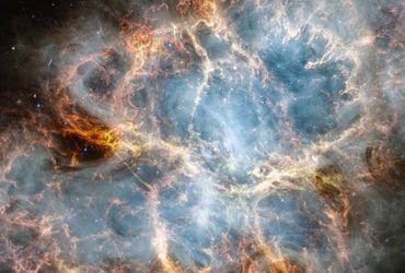 Crab Nebula's Eerie Luminescence Captured by Webb Telescope