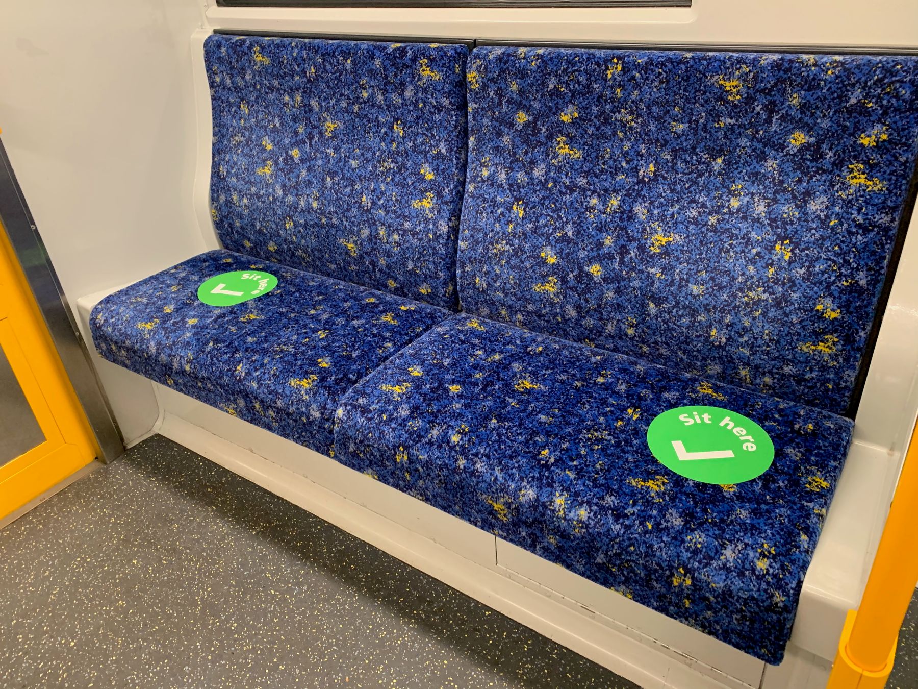 Coronavirus public safety signage inside a Sydney train