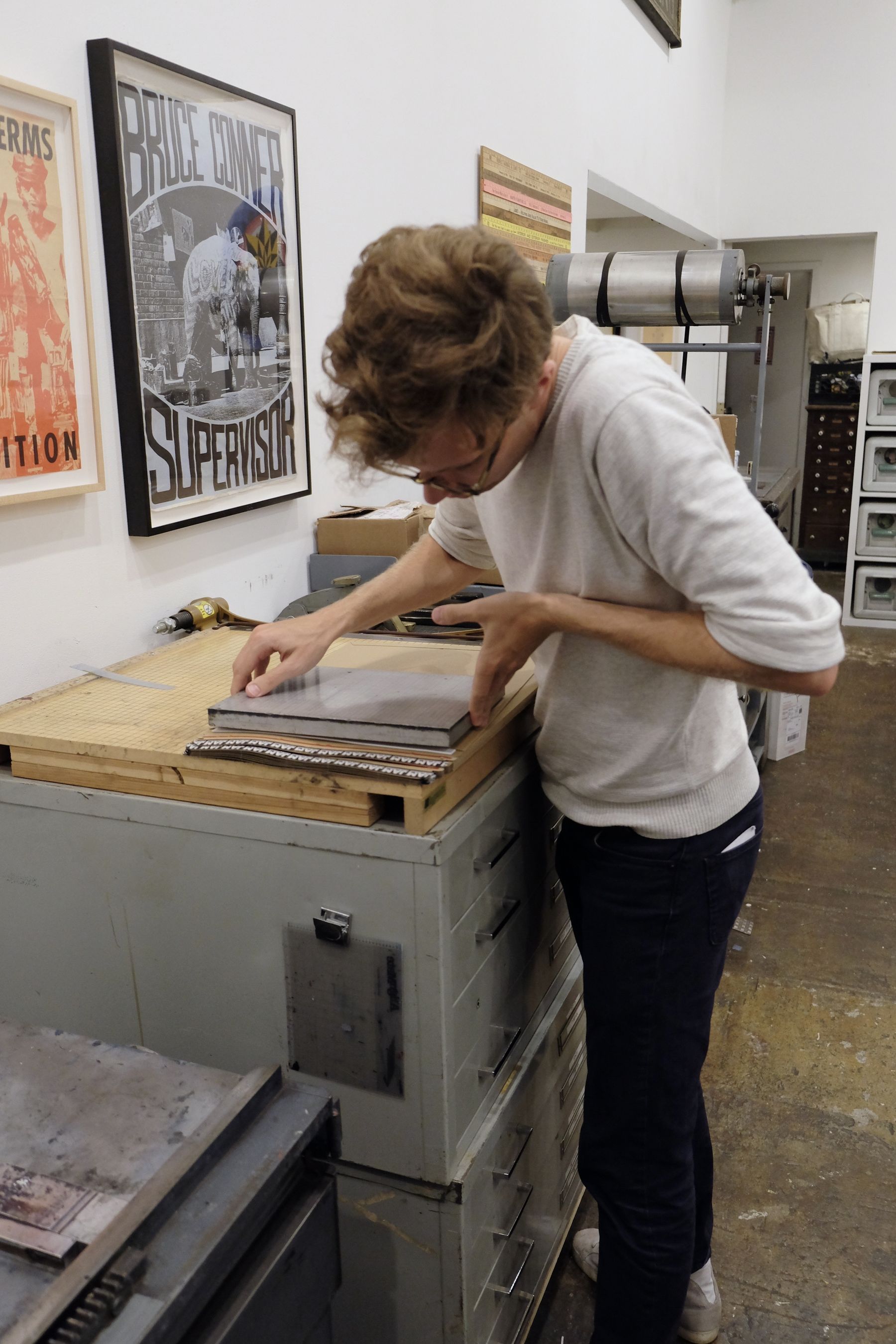 Jon scoring envelopes to properly fit posters