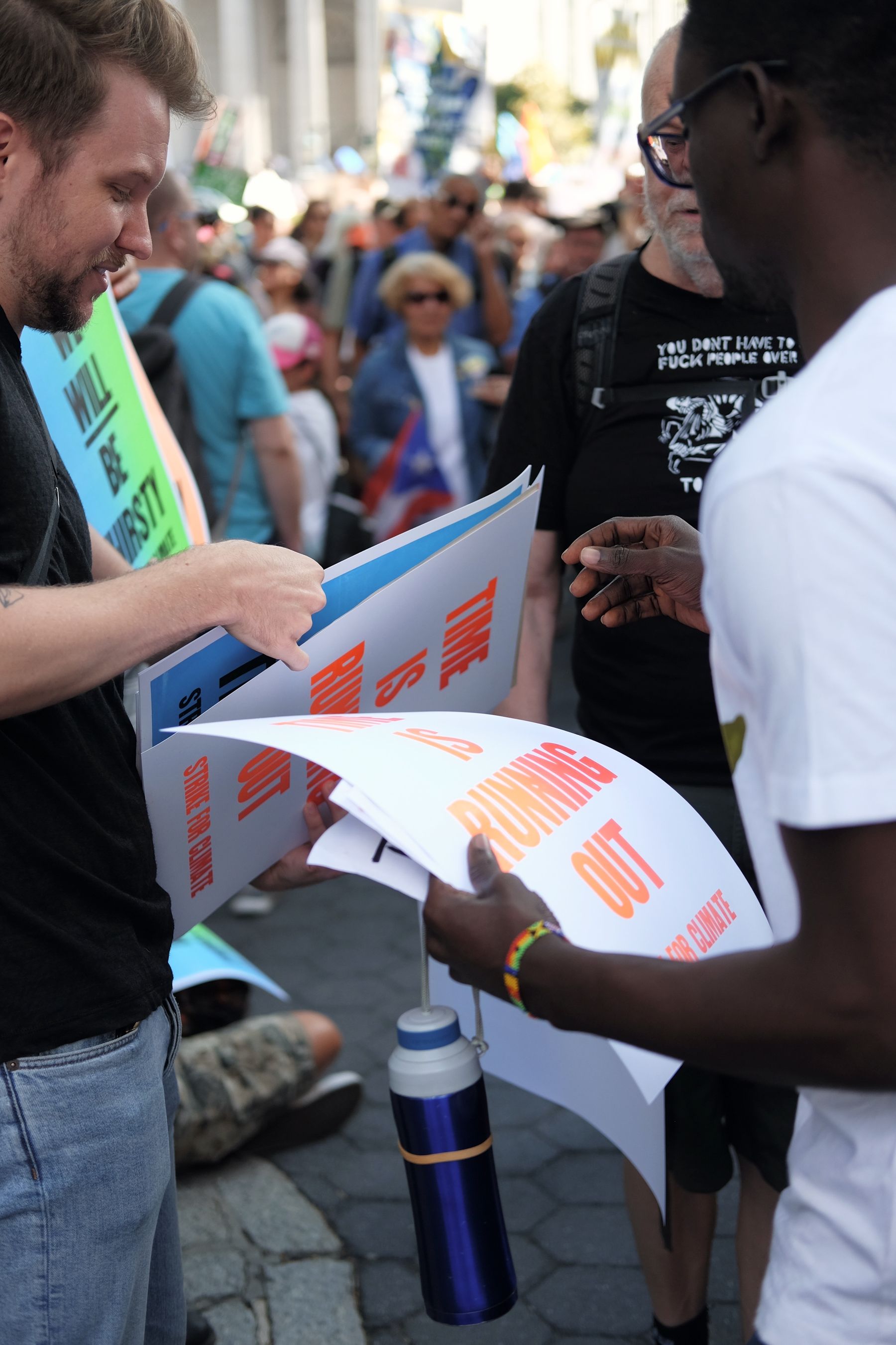 Myles handing out a poster