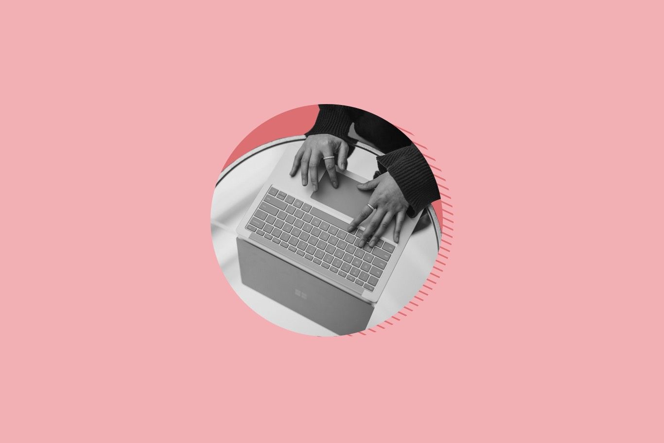 photo of someone typing on their laptop
