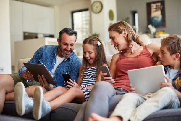 Family using internet and devices at home