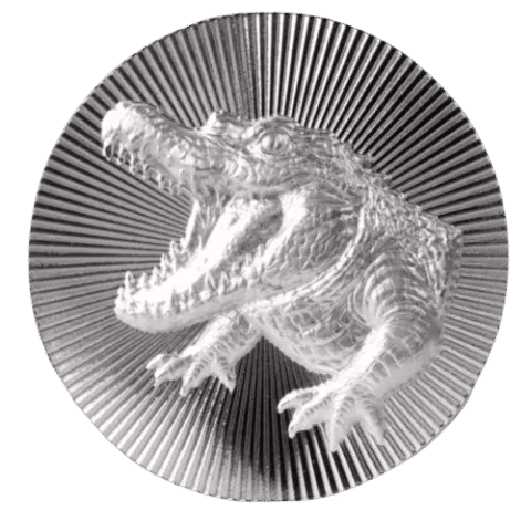 This image shows the 1oz Scottsdale Crocodile Stacker Silver Round, featuring a crocodile with it's jaws open wide facing the left.