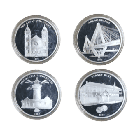 the reverse of the 4 coins from this collection, featuring the Sydney Mint, The Great Synagogue, Macquarie Lighthouse and ANZAC Bridge.