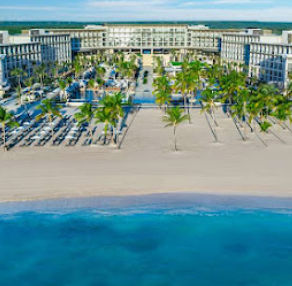 Aerial view of the Hyatt Zilara Cap Cana resort with white sand beach and pools.