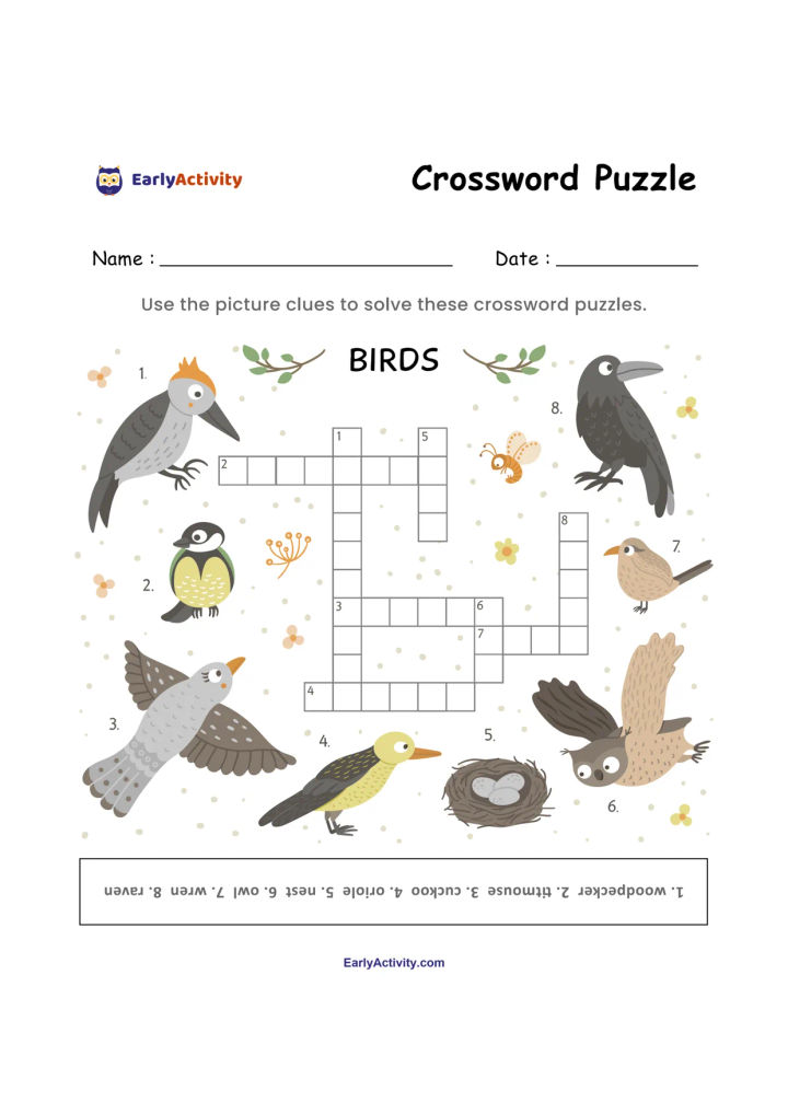 Crossword worksheet with a central grid and illustrated bird clues, including an owl, crow, parrot, small birds, and a nest.