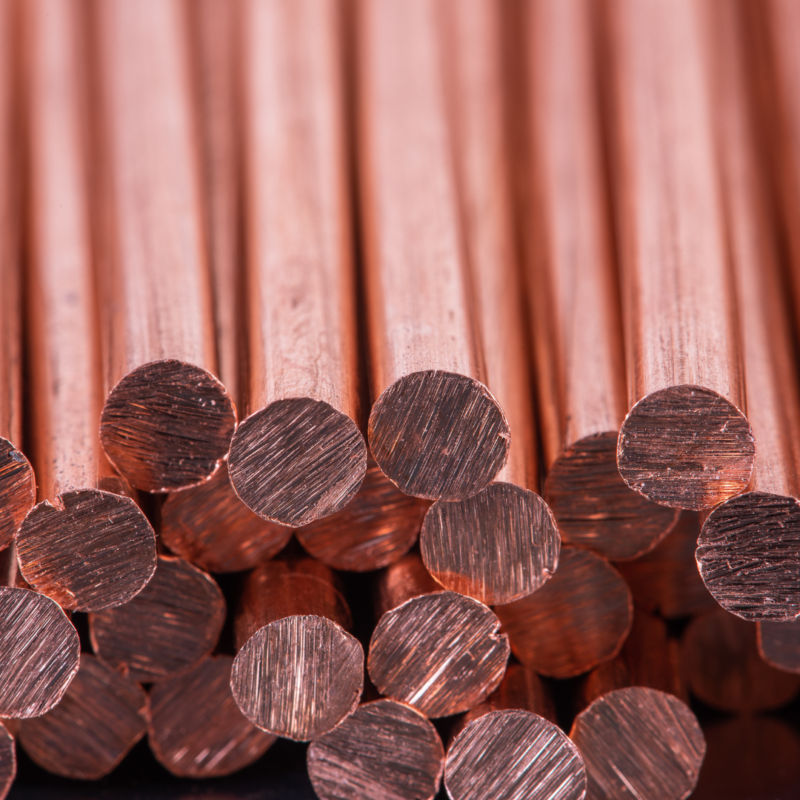 "Solid copper rods for electrical grounding and industrial use in India."