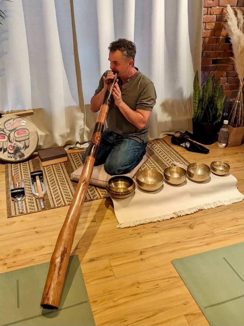 Kai playing didjeridoo