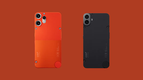 Two iPhones in different colors displayed on an orange background, featured in the CMF Phone 2 Pro review.