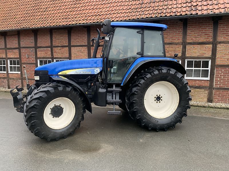 E-FARM: New Holland TM120 - Traktor - id RR8CRIJ - 32 500 € - Rok produkcji: 2003 - Motogodziny: 6600,Moc silnika: 120,Niemcy
