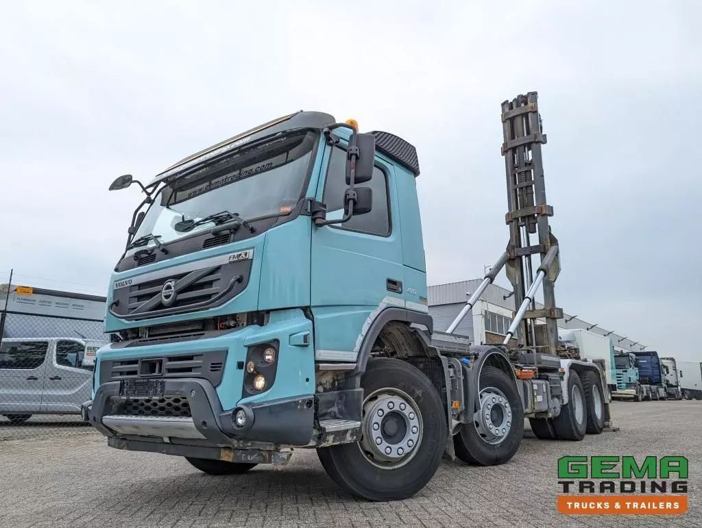 VOLVO fmx410 8x4 /4 daycab euro5 - haakarm 25t - cementsilo - radiogra Trailer €37,950