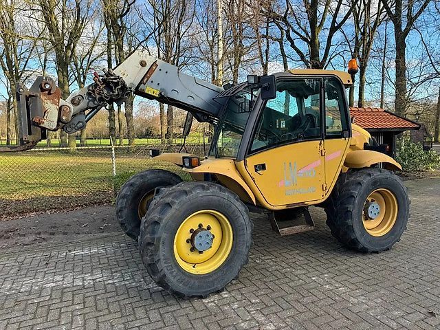 New Holland lm410 verreiker shovel loader Manipulador telescópico 14.750 €