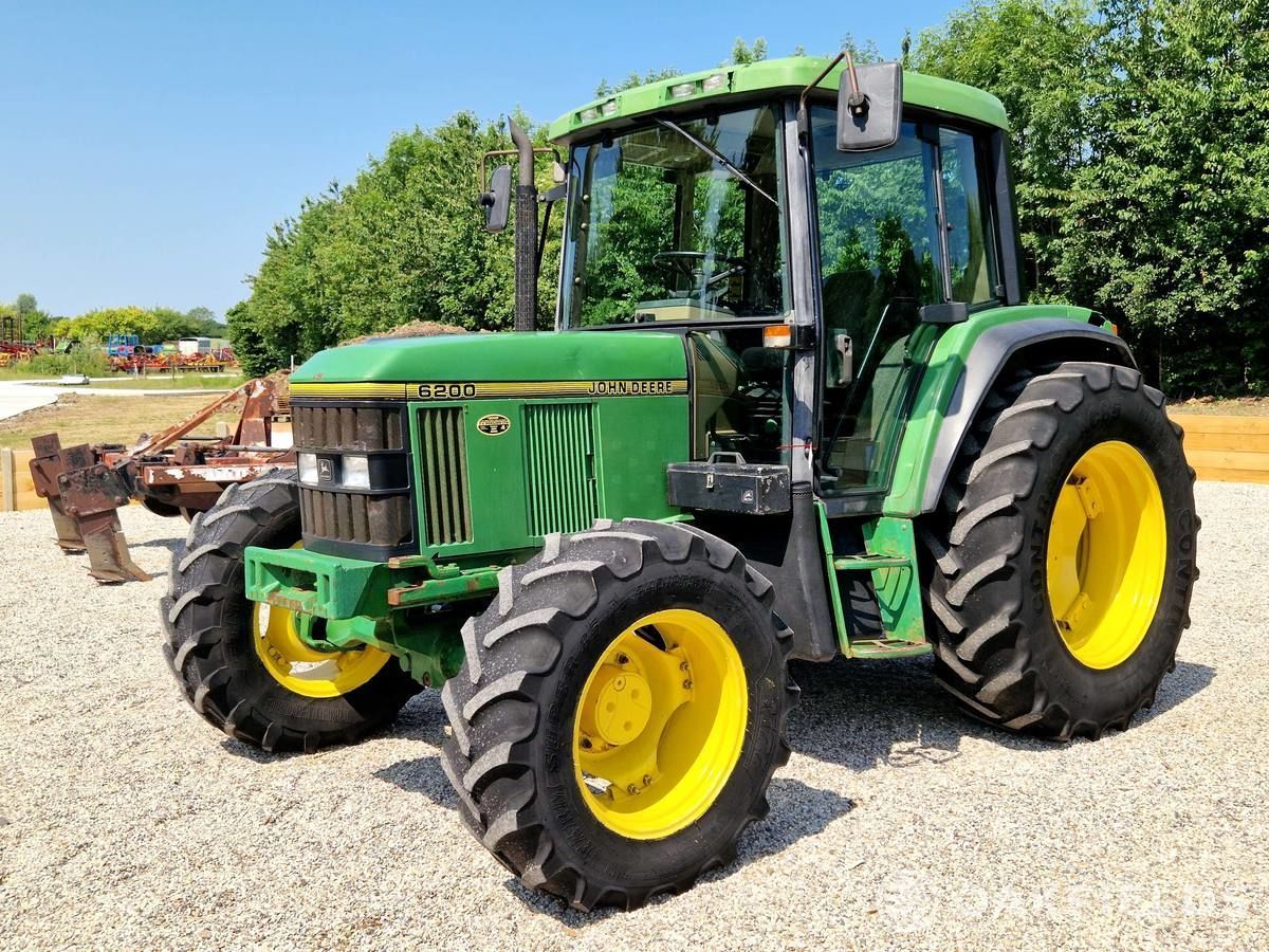 E-FARM: John Deere 6200 - Tracteur - id EYFEN2W - 19 398 € - Année: 1996 - Lecture du nombre d'heure: 9 621,Puissance du moteur (chevaux): 84,Royaume-Uni