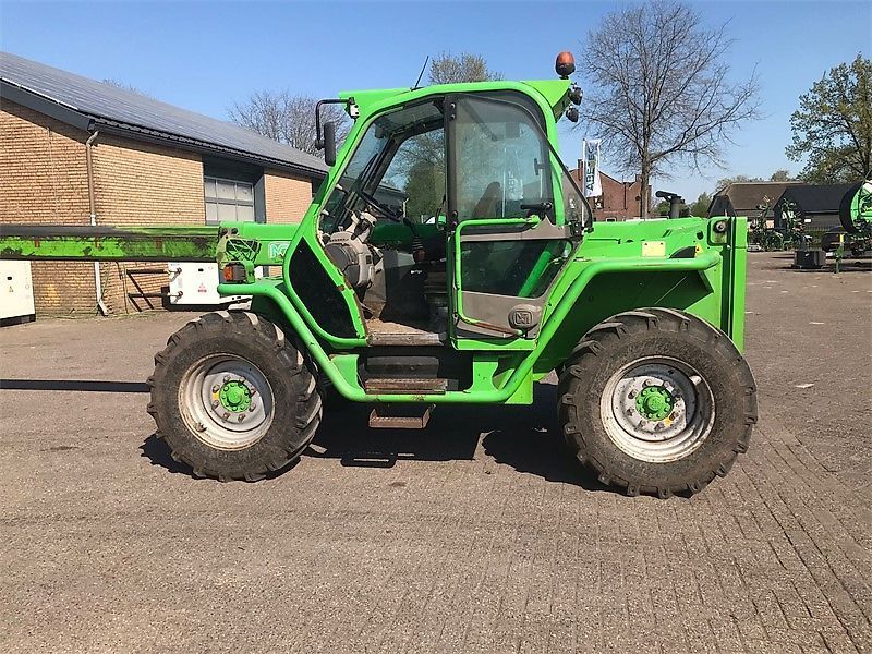 E-FARM: Merlo 34-7 top - Chargeur télescopique  - id TGTTIKM - 29 750 € - Année: 2010 - Lecture du nombre d'heure: 8 000,Pays-Bas