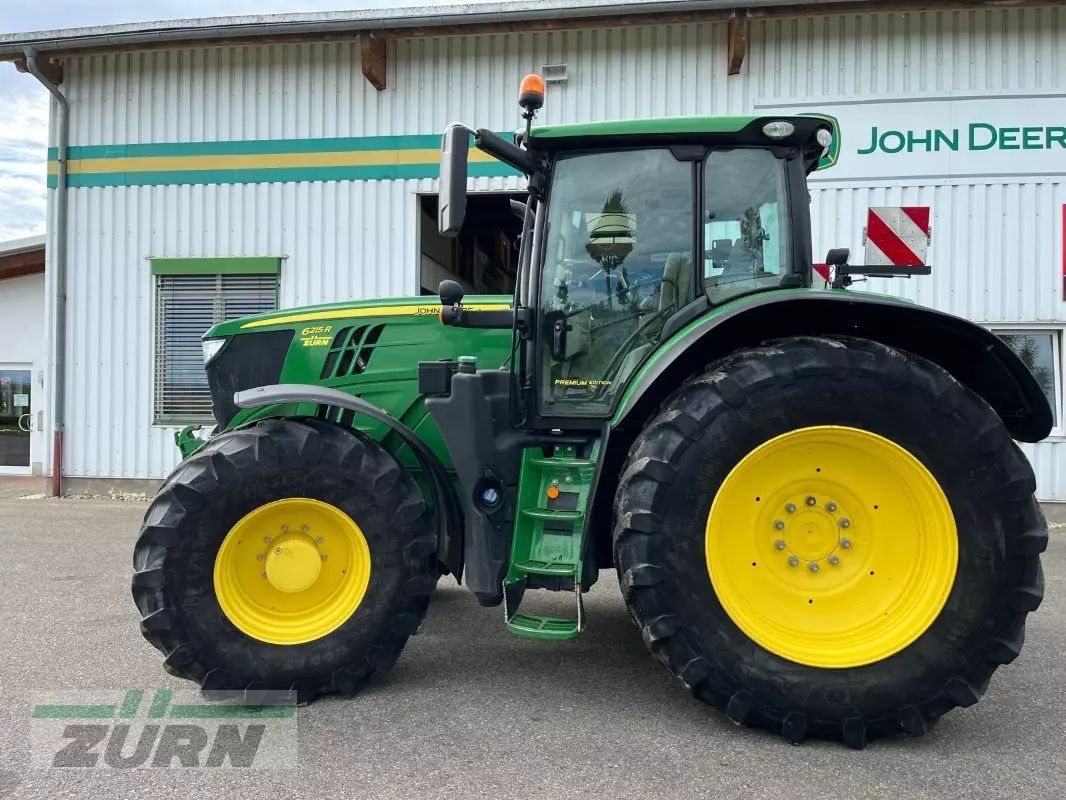 E-FARM: John Deere 6215 R - Traktor - id QXZQMXA - 99 999 EUR - Gyártási év: 2020 - Üzemóra (motor): 4940,Motor teljesítménye (LE): 215,Németország