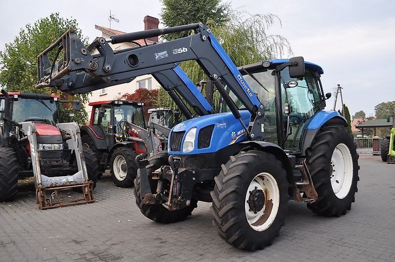 E-FARM: New Holland T6.140 - Tracteur - id XGXYVZC - 30 167 € - Année: 2014 - Lecture du nombre d'heure: 6 900,Puissance du moteur (chevaux): 150,Pologne