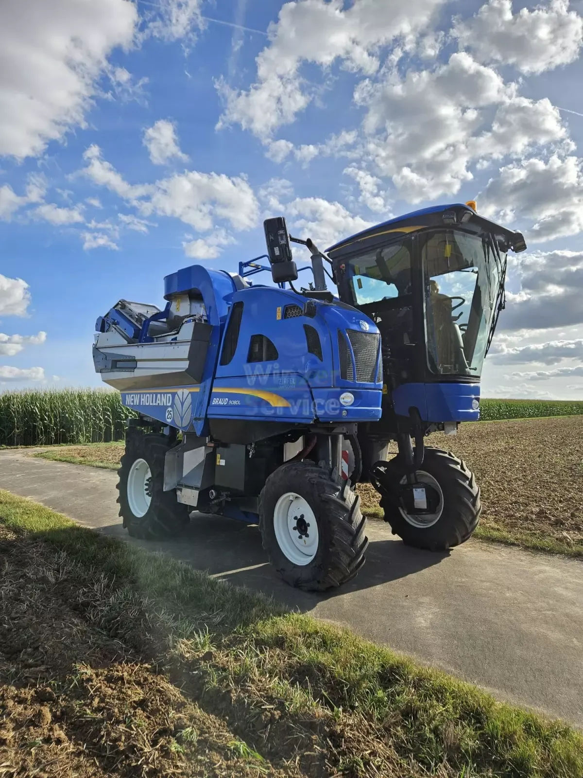 E-FARM: New Holland Braud 9080L - Vendemmiatrice - id 9JGUSKG - Anno di costruzione: 2013 - Germania
