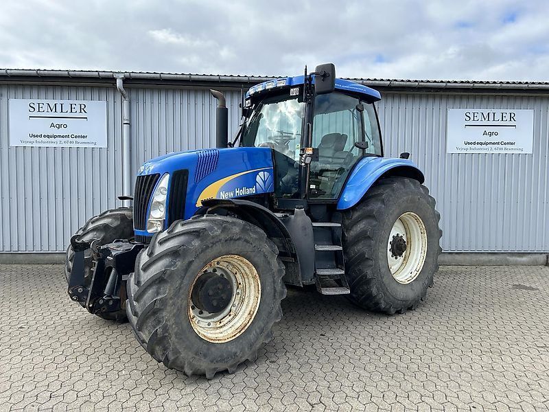 E-FARM: New Holland TG285 - Traktor - id UMR2LAW - 26.673 € - Baujahr: 2004 - Abgelesene Motorstunden: 7.733,Dänemark