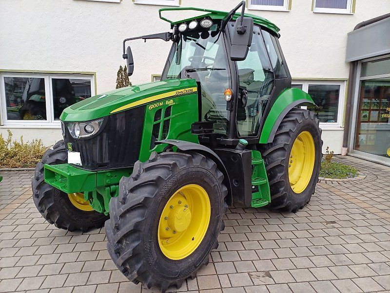 E-FARM: John Deere 6100 M - Traktor - id V4JPPNZ - 96 639 EUR - Üzemóra (motor): 643 - Motor teljesítménye (LE): 100,Németország