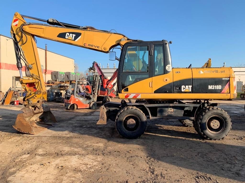 Caterpillar m 318 d Radbagger 56.367 €