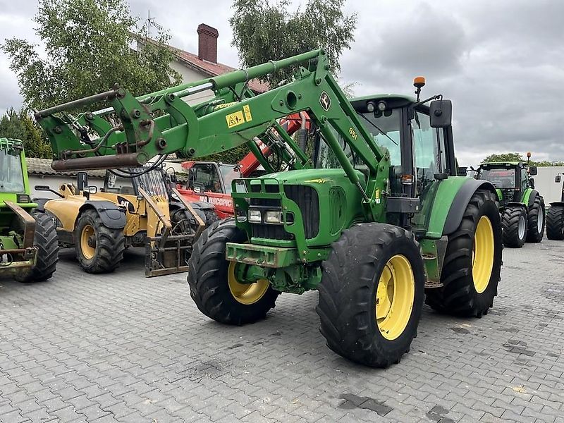 E-FARM: John Deere 6420 Premium - Tractor - id K2IZKQI - 25.595 € - Año: 2002 - Horas: 8400,Potencia del motor: 125,Polonia