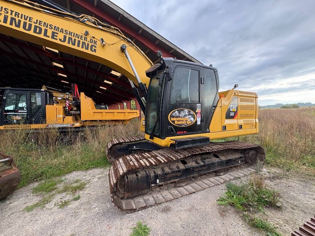 Caterpillar 323 ng - nextgen Raupenbagger 130.499 €