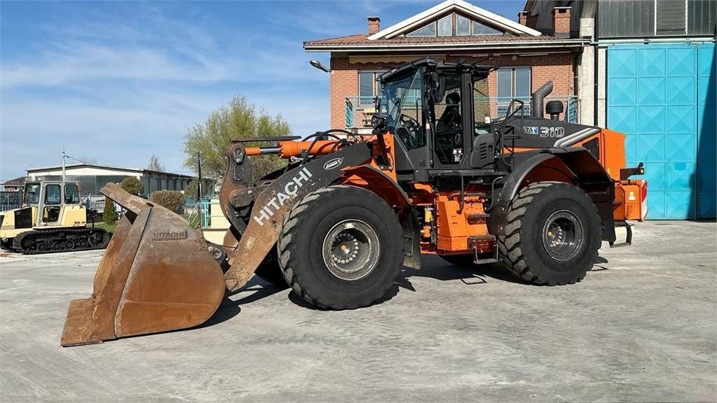 E-FARM: Hitachi zw310-7 - Pala gommata - id WUUPNBC - 175.000 € - Anno di costruzione: 2022 - Ore: 3.035,Italia