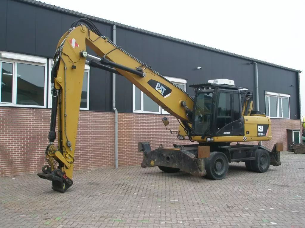 Caterpillar m318d Bagger