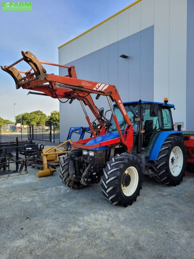 E-FARM: New Holland TL100 - Tractor - id KMW5NGW - €33,000 - Year of construction: 2002 - Engine hours: 7,391,Engine power (HP): 97,France