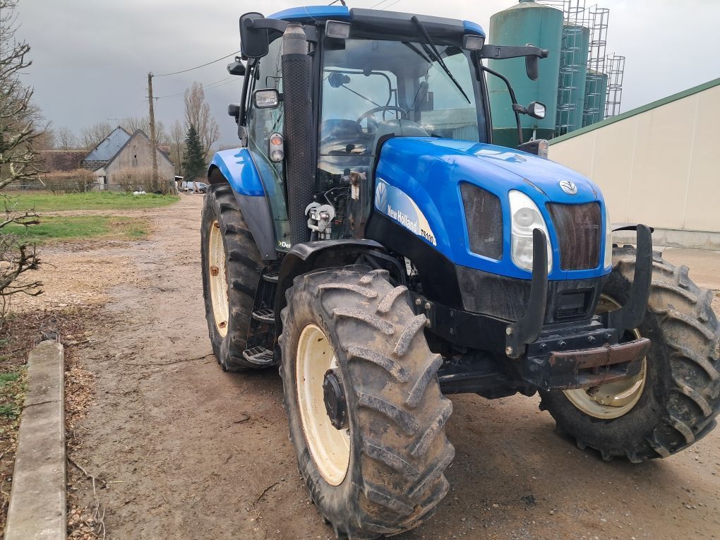 E-FARM: New Holland TL100 - Traktor - id 7YESSCN - 25.000 € - Produktionsår: 2006 - Motortimer: 7.945,Motoreffekt (HP): 100,Frankrig