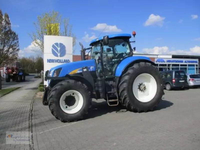 E-FARM: New Holland T7050 PC - Trattore - id CQBXBJD - 49.496 € - Anno di costruzione: 2009 - Ore: 7.780,Potenza del motore: 241,Germania
