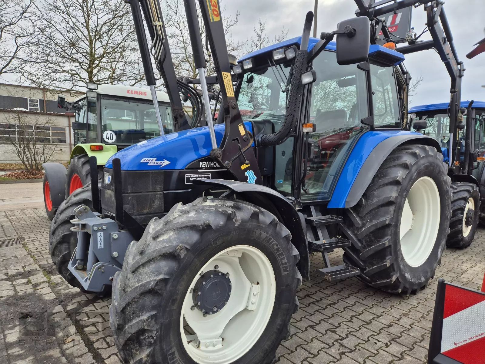 E-FARM: New Holland TS115 - Tractor - id GWUZGHF - 37.106 € - Año: 2001 - Horas: 5848,Alemania