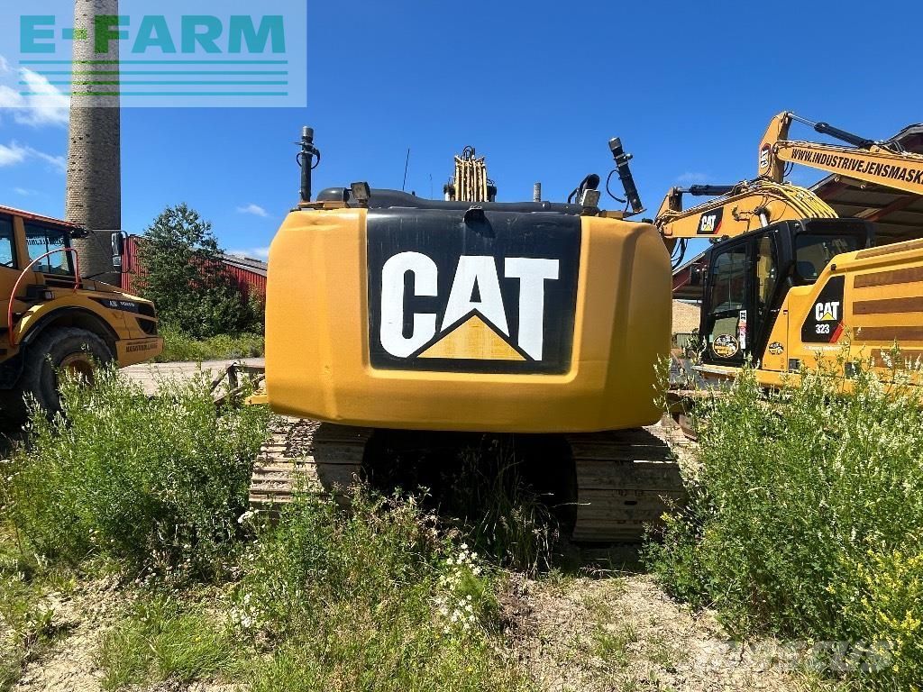 Caterpillar 323 el Gravemaskine med larvebånd 59.963 €